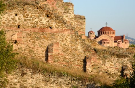 Part of the Byzantine wall that once surrounded Thessaloniki, with the Hagia Sophia in the background. (Photograph by Dan Diffendale, Flickr)